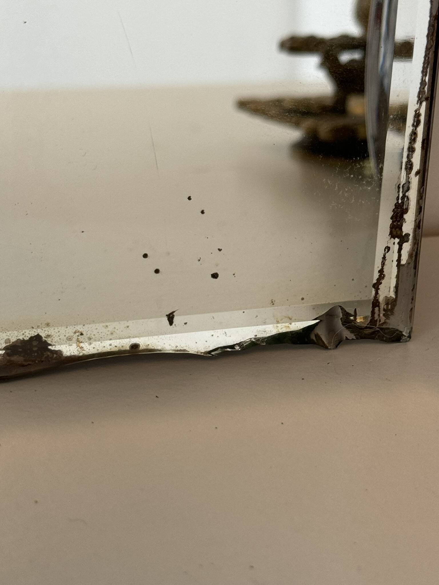 Vintage beveled mirror