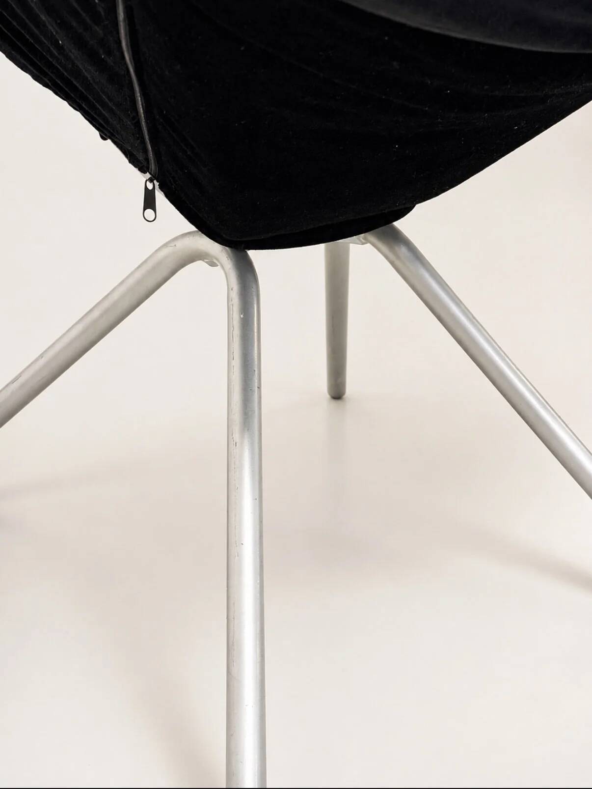 Vintage black velvet swivel lounge chair, sculptural butterfly shape.