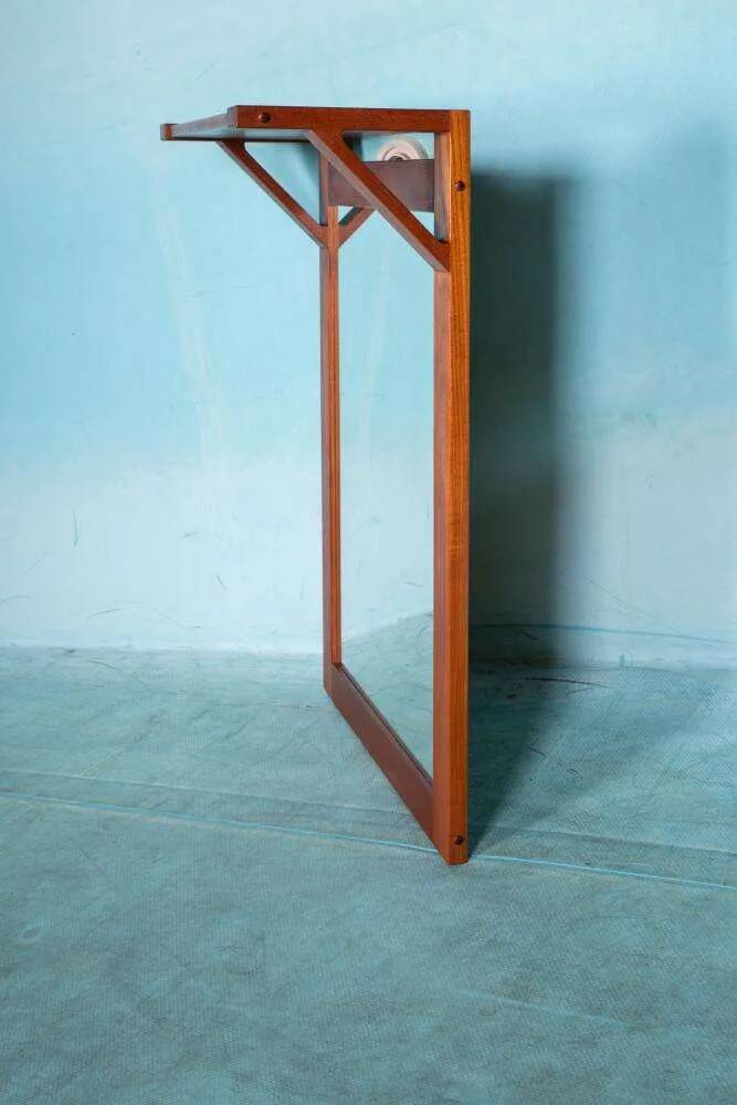 Danish teak mirror with shelf for hats from the 1960s.
