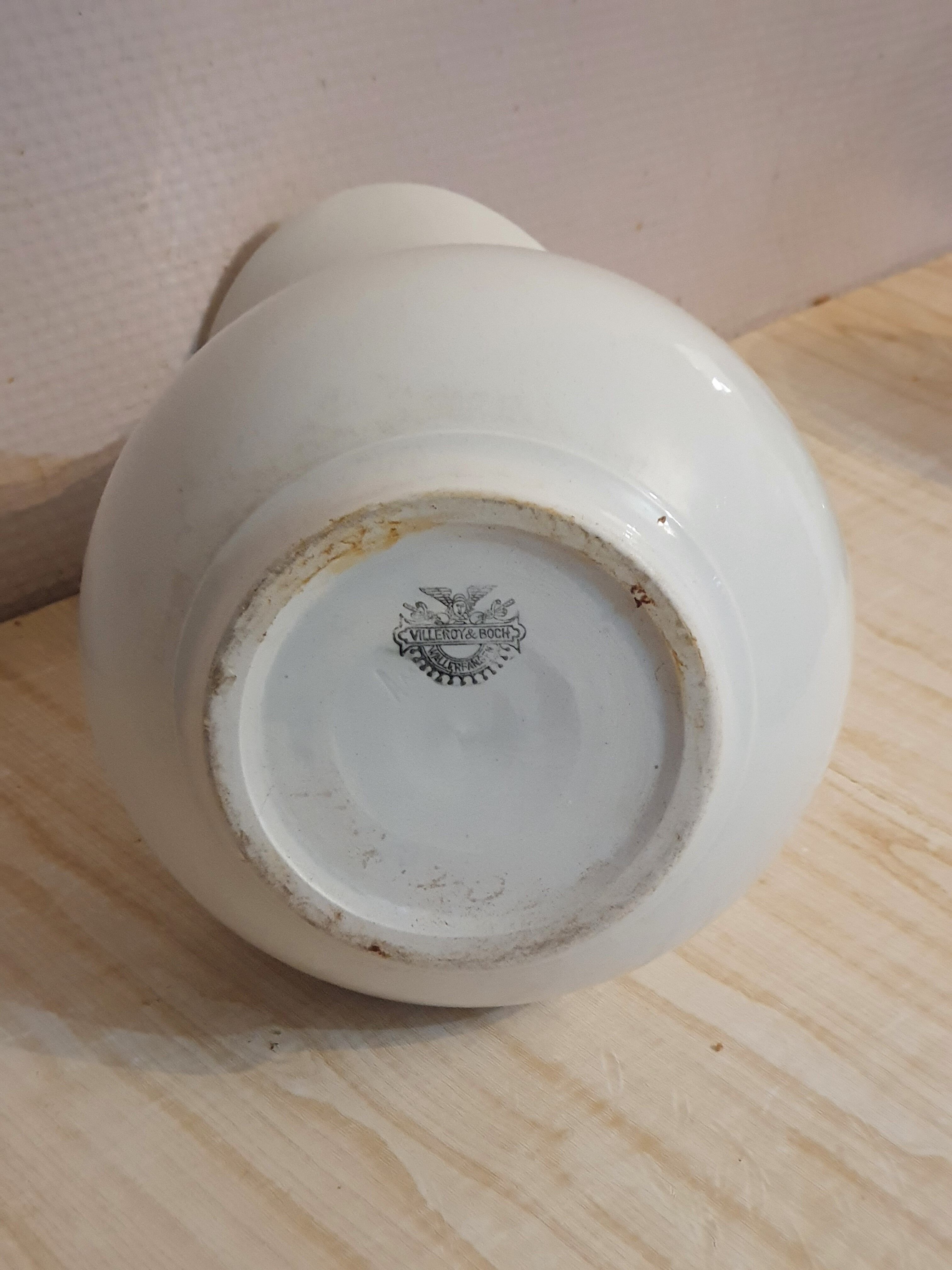 Antique pitcher pitcher in white porcelain