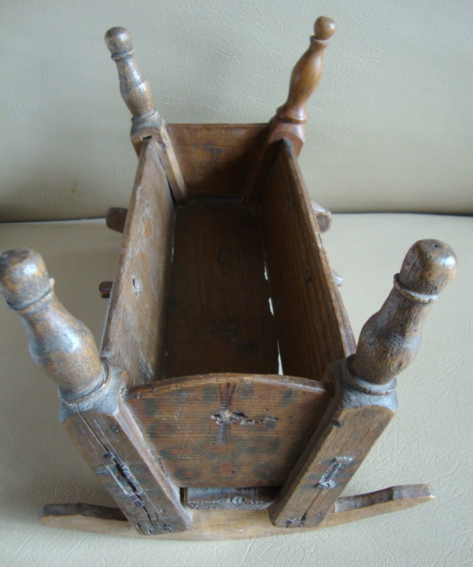 Wooden rocking cradle for dolls