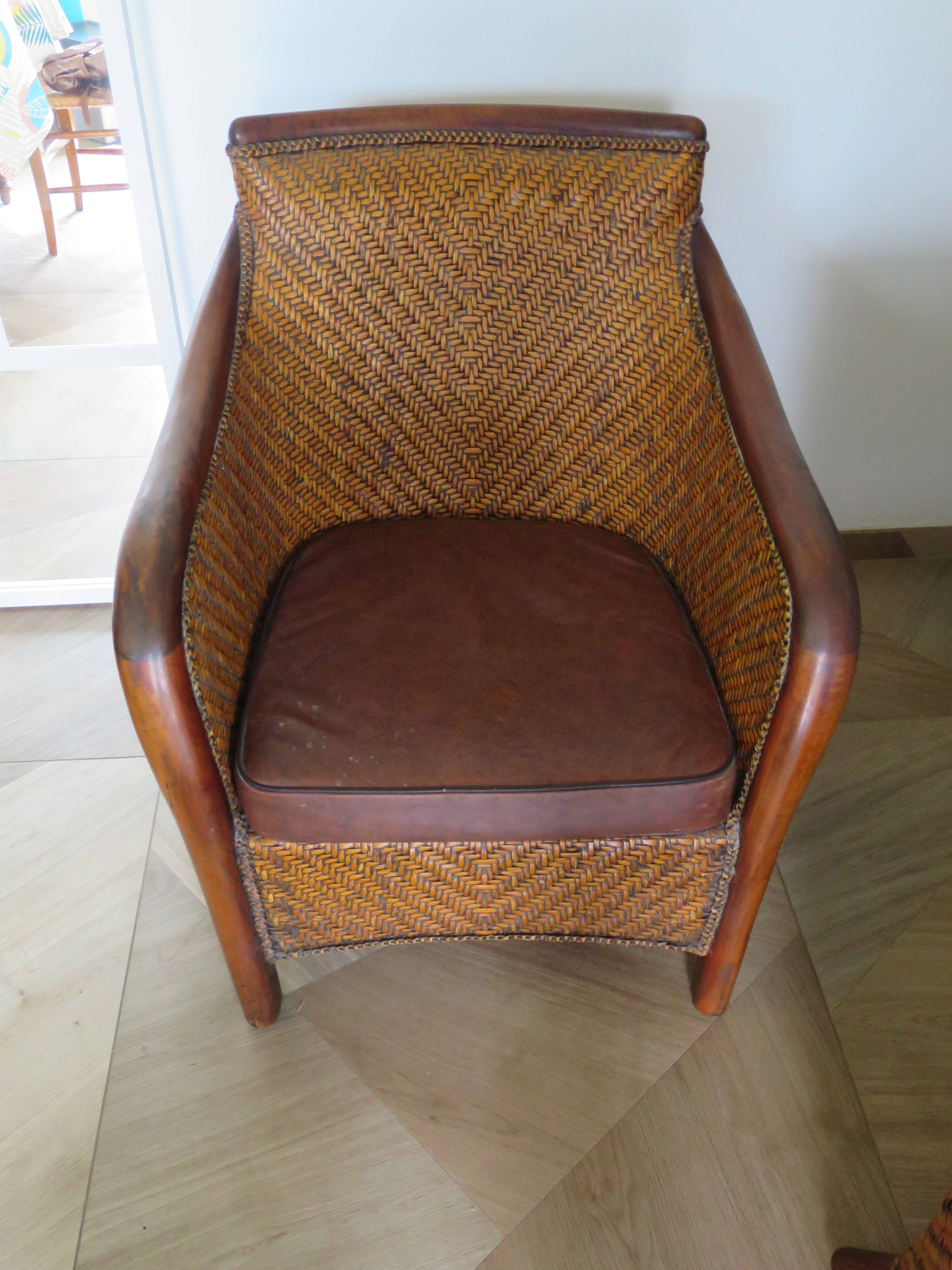 Woven rattan armchair and exotic wood - Colonial style - 1980s
