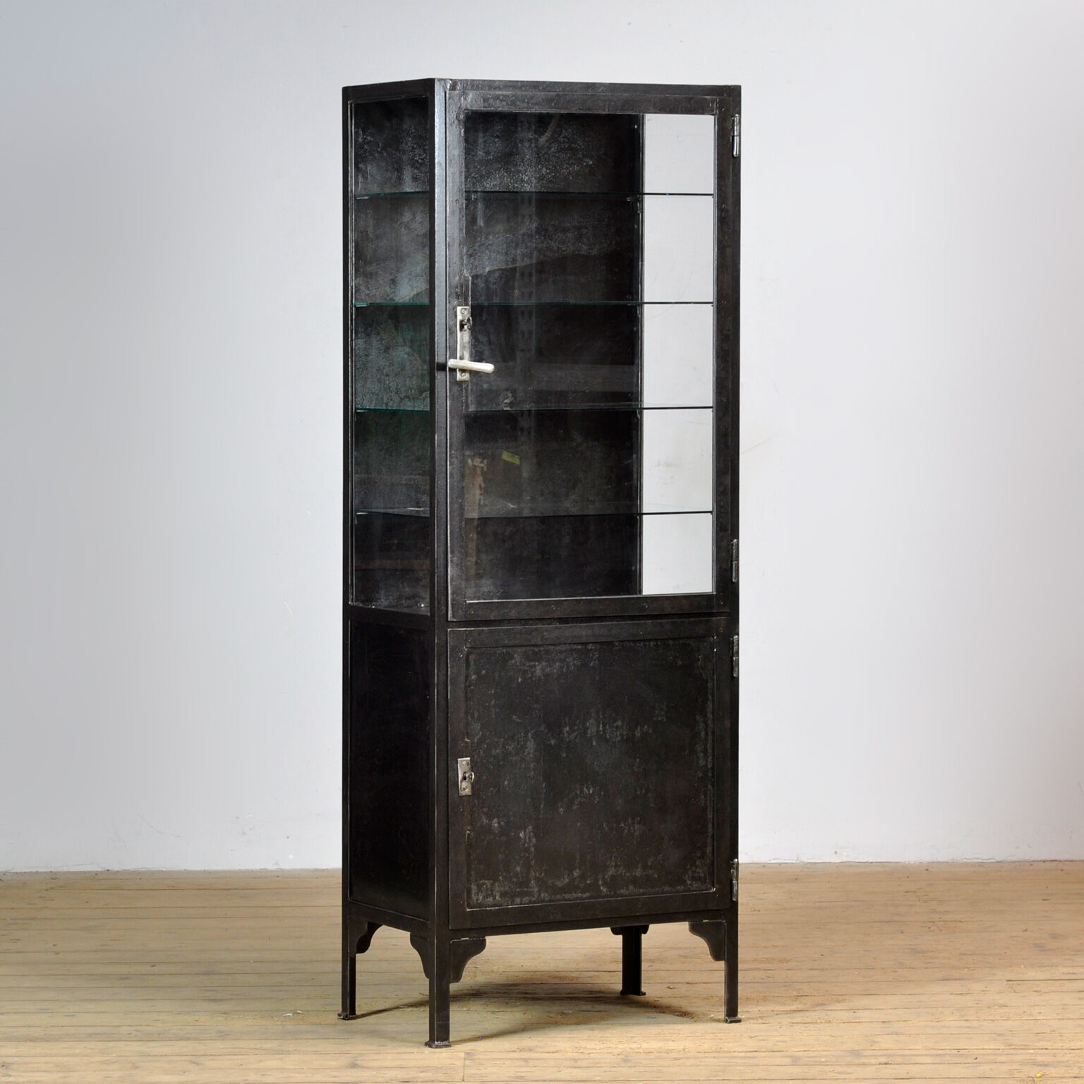 Polished iron medical cabinet, 1930s