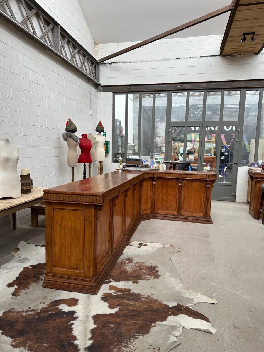 Large corner bar counter from the late 19th century.