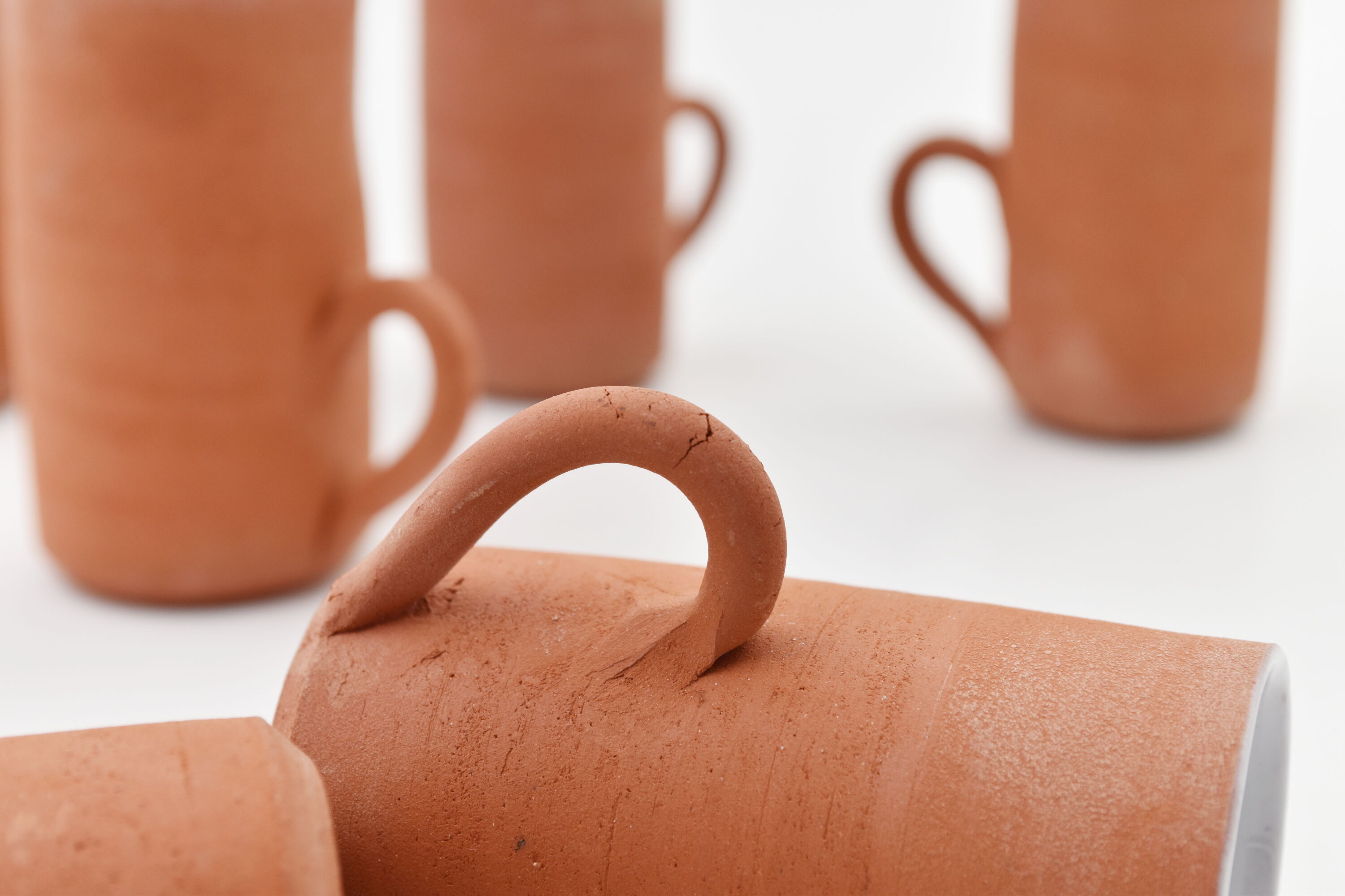 Series of six terracotta cups