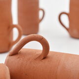 Series of six terracotta cups