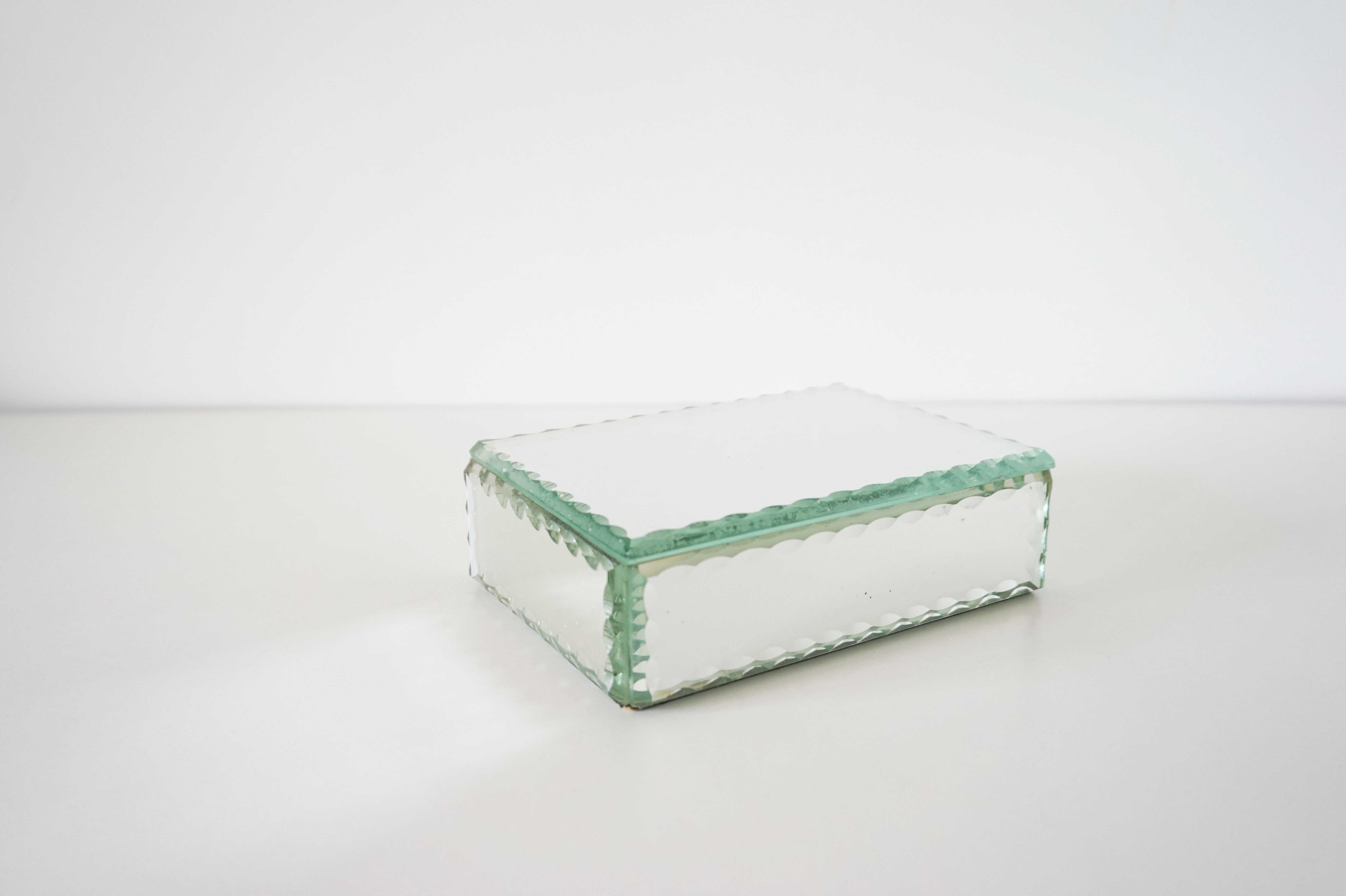 Jewelry box in chiseled mirror