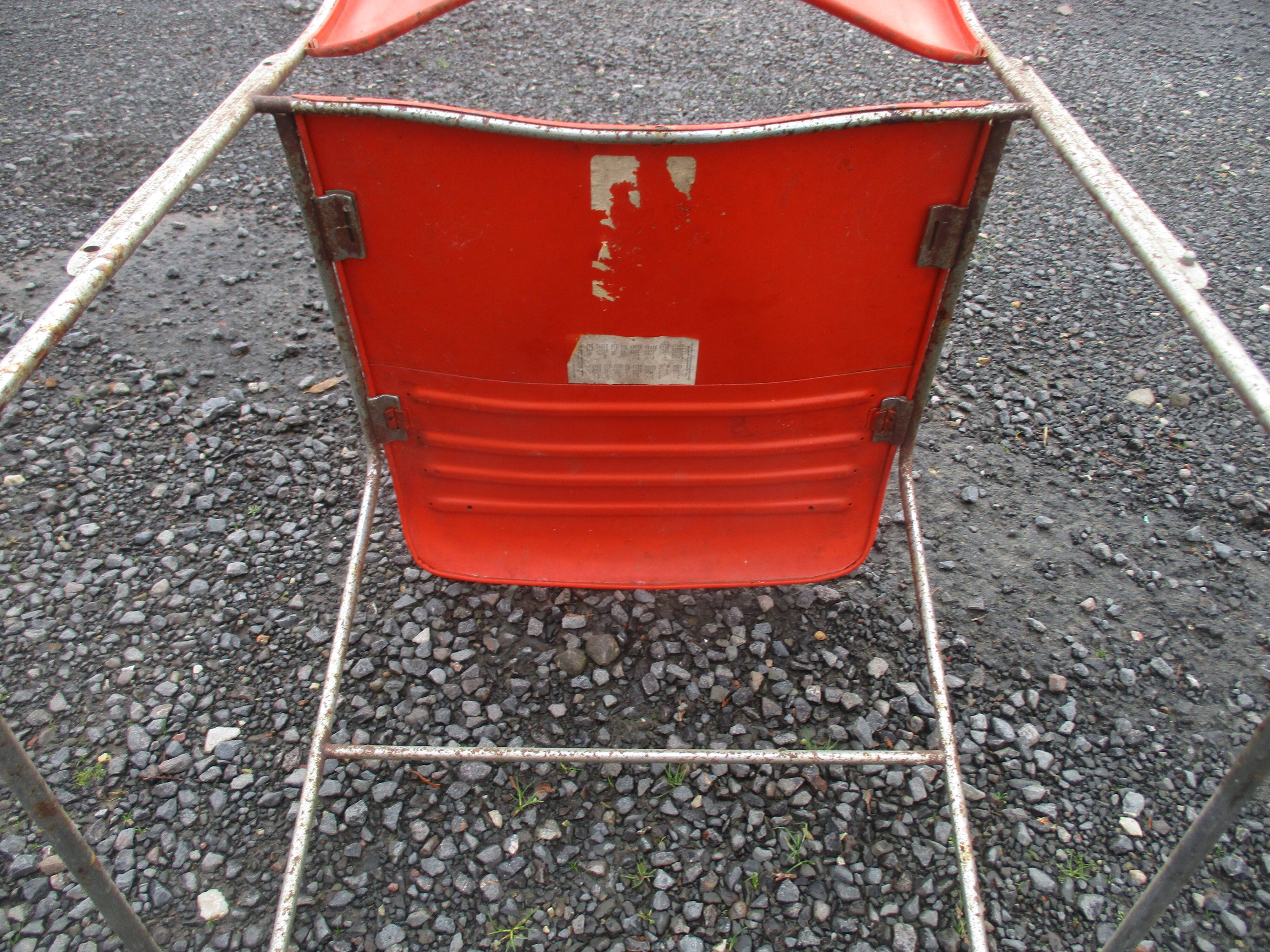 3 iron and plastic chairs