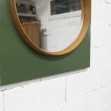 Unusual round wall mirror 60 cm teak edge on green rectangular board 1960.