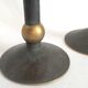 Pair of patinated bronze candlesticks