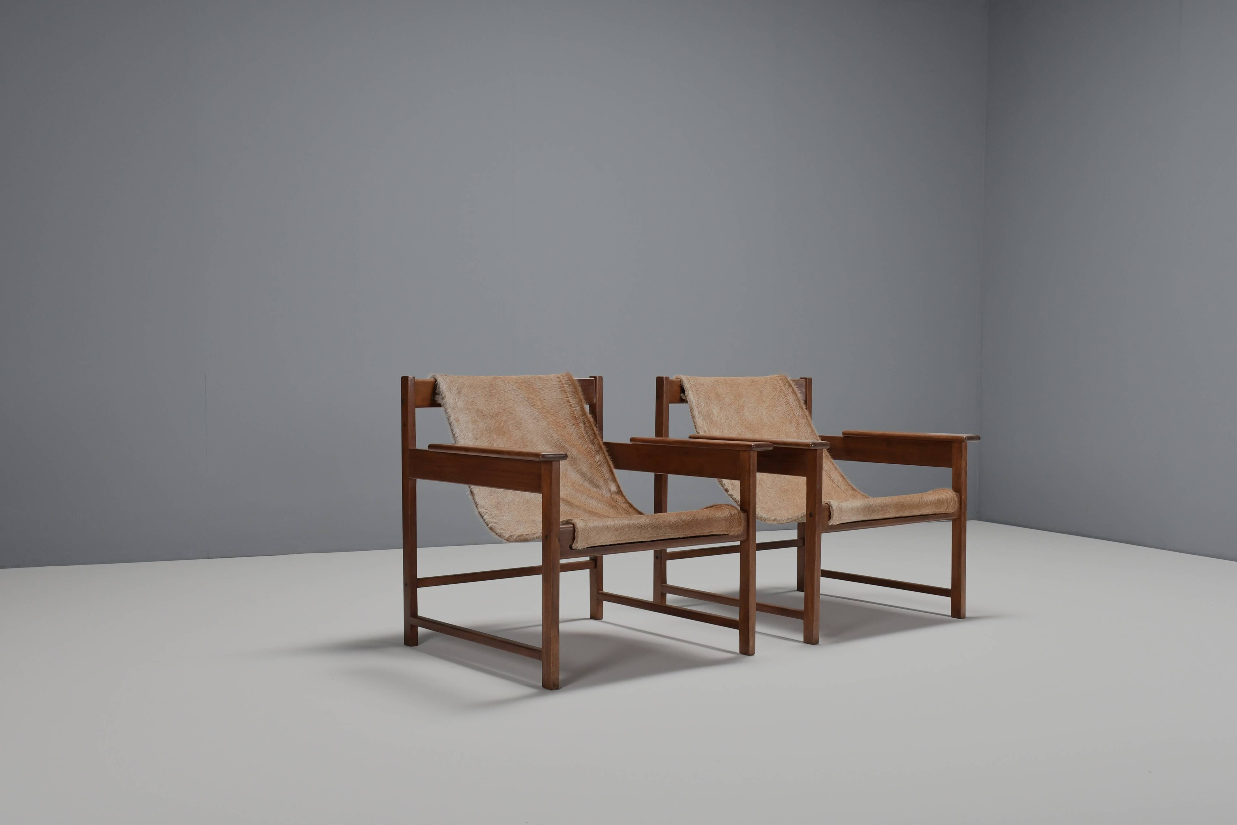 Pair of ‘Lia’ Armchairs by Sérgio Rodrigues, Brazil, 1962, Jacaranda and Cowhide
