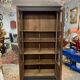Black bookcase with glass doors