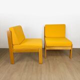 Pair of vintage Scandinavian armchairs in pine and fabric.