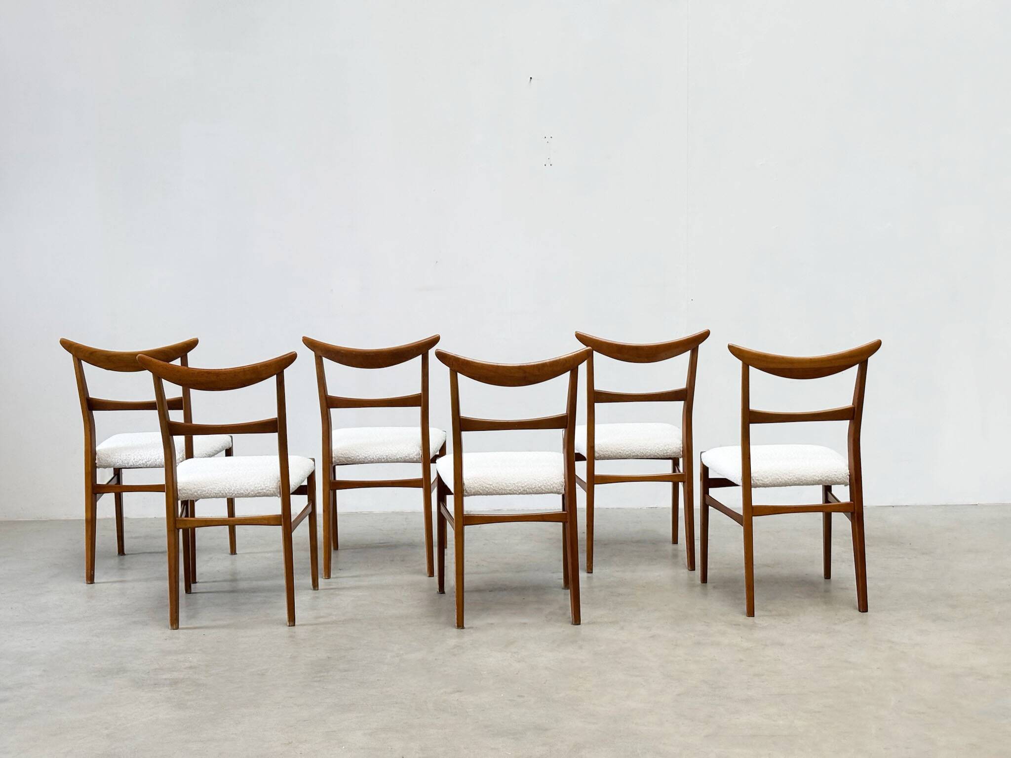 Set of six walnut Lübke dining chairs