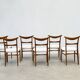 Set of six walnut Lübke dining chairs