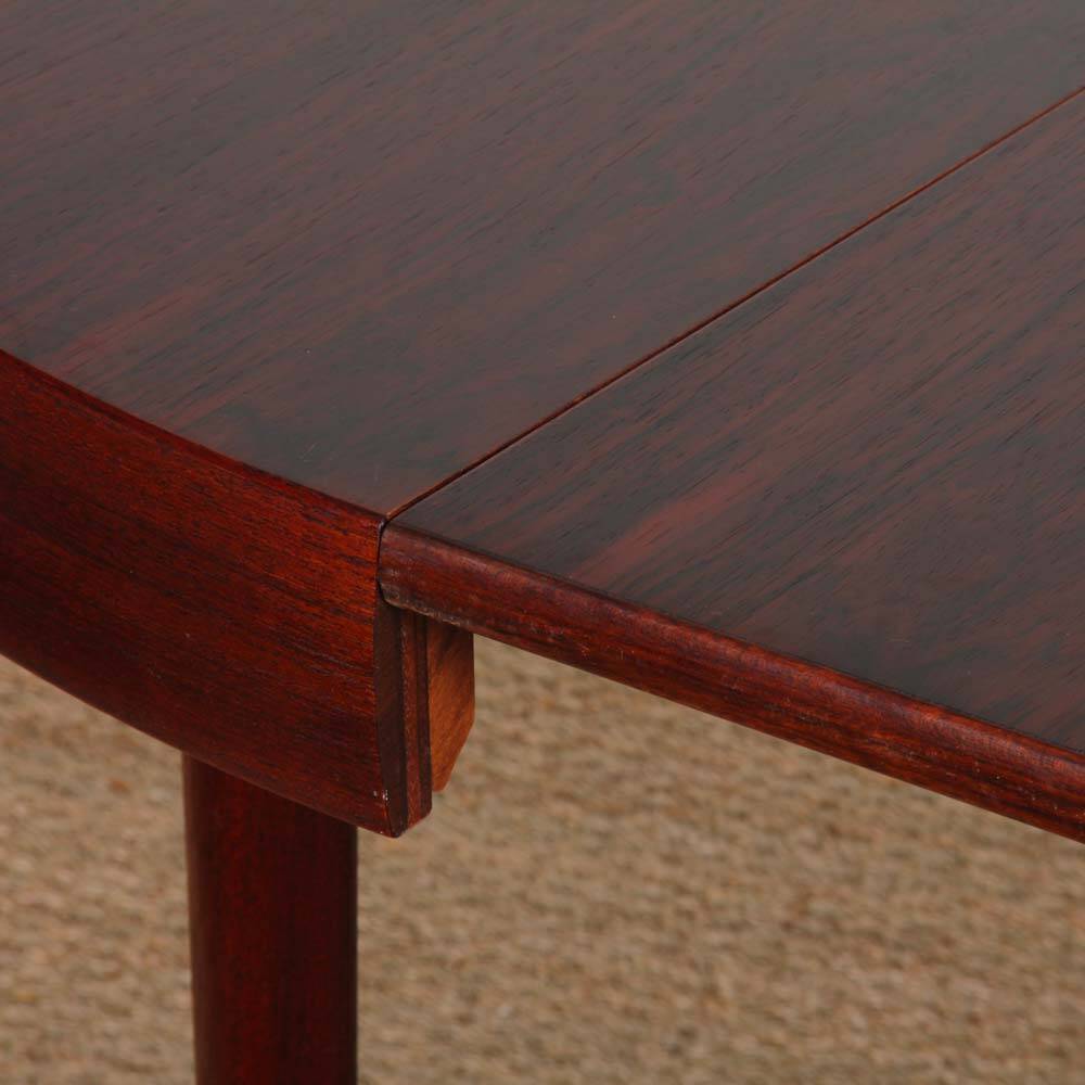 Round extendable dining table in Rio rosewood, 1960