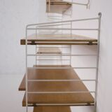 Modular wall shelf String.