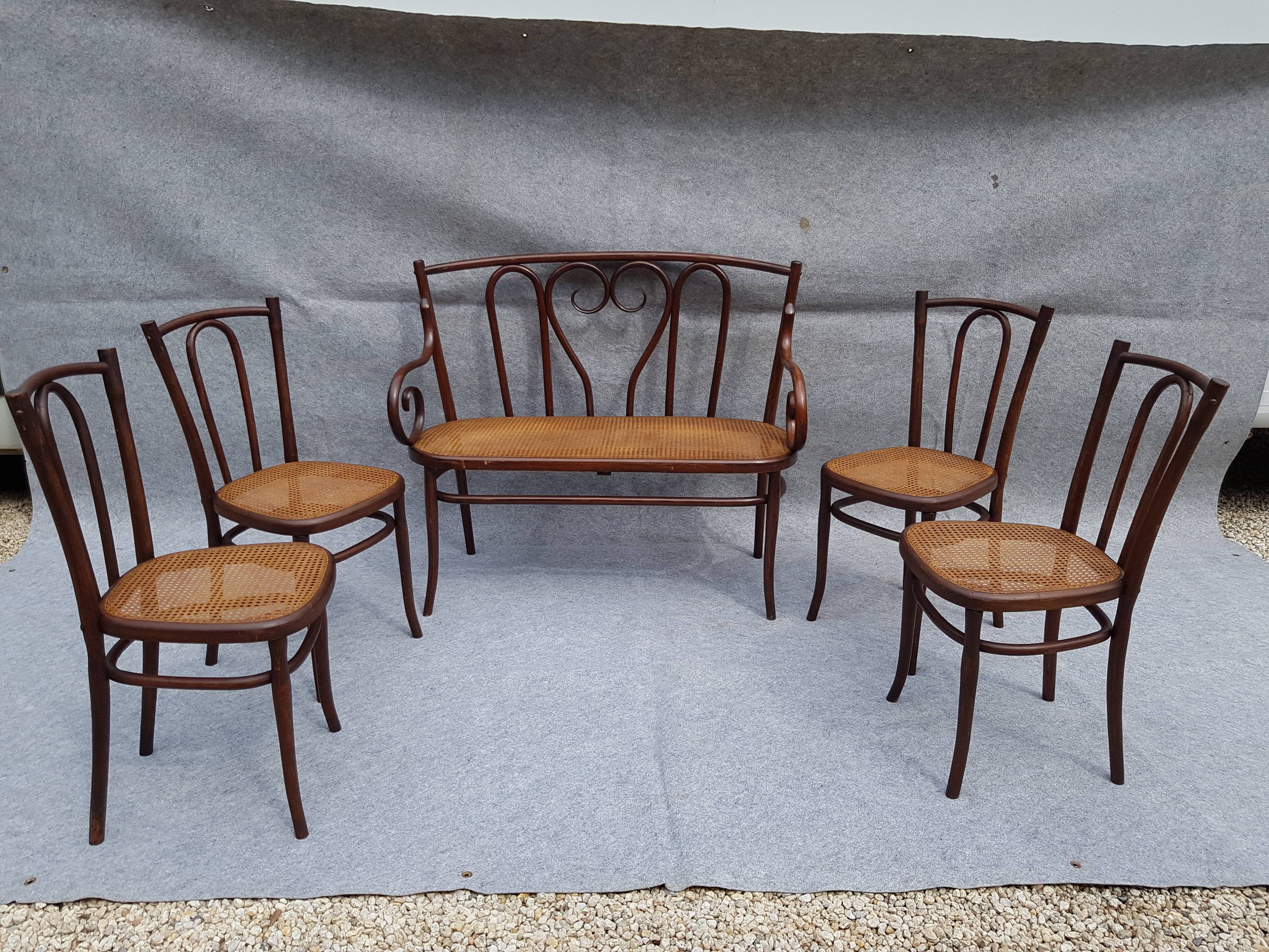 Curved wooden lounge 1900, a bench and four chairs