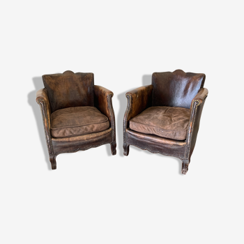 Pair of leather club chairs in late XIX