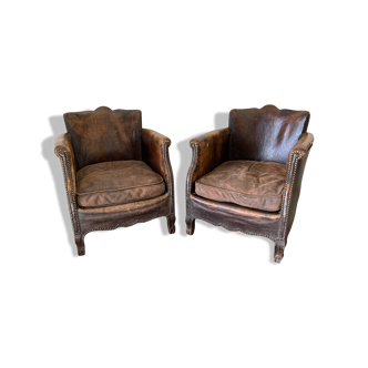 Pair of leather club chairs in late XIX