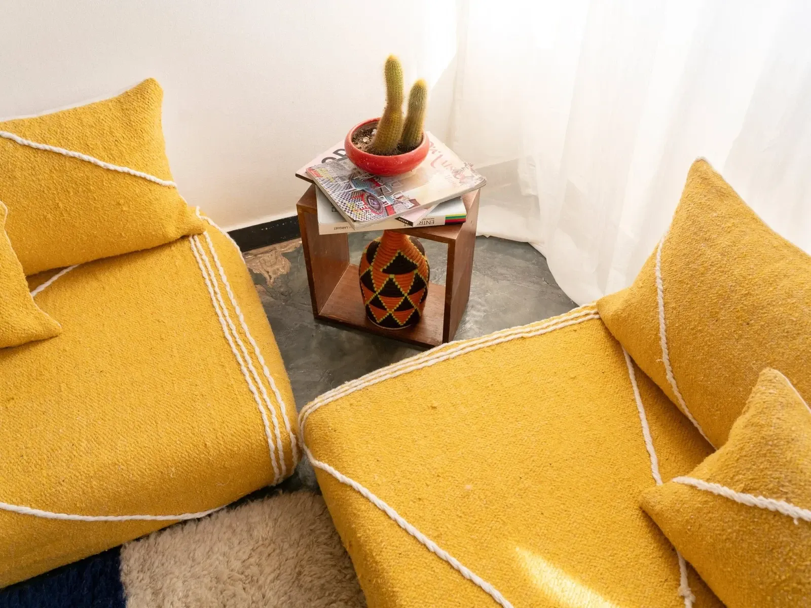 Set of yellow Moroccan floor sofa covers.