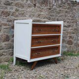 Scandinavian chest of drawers made of wood and rattan