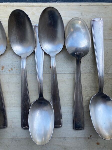 11 cuillères à soupe en métal argenté