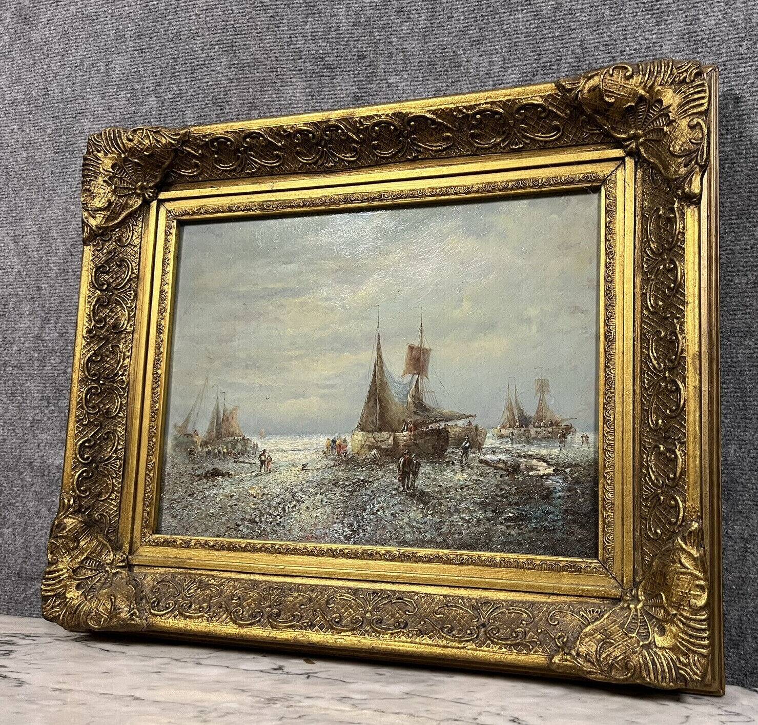 Tableau vintage figurant une vue animée a marée basse
