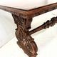 Table a manger de style Renaissance en bois massif sculpté XX siècle