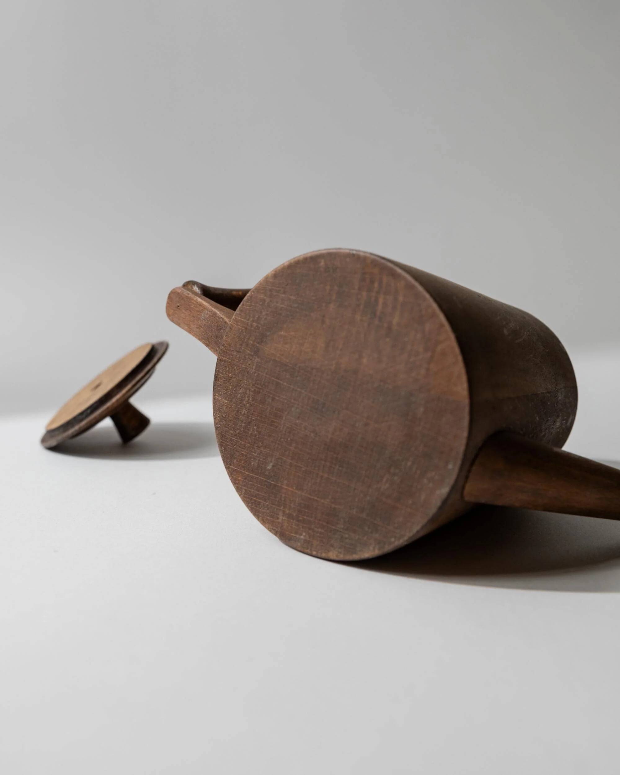 Vintage wooden pitcher from the 1960s, hand-carved.
