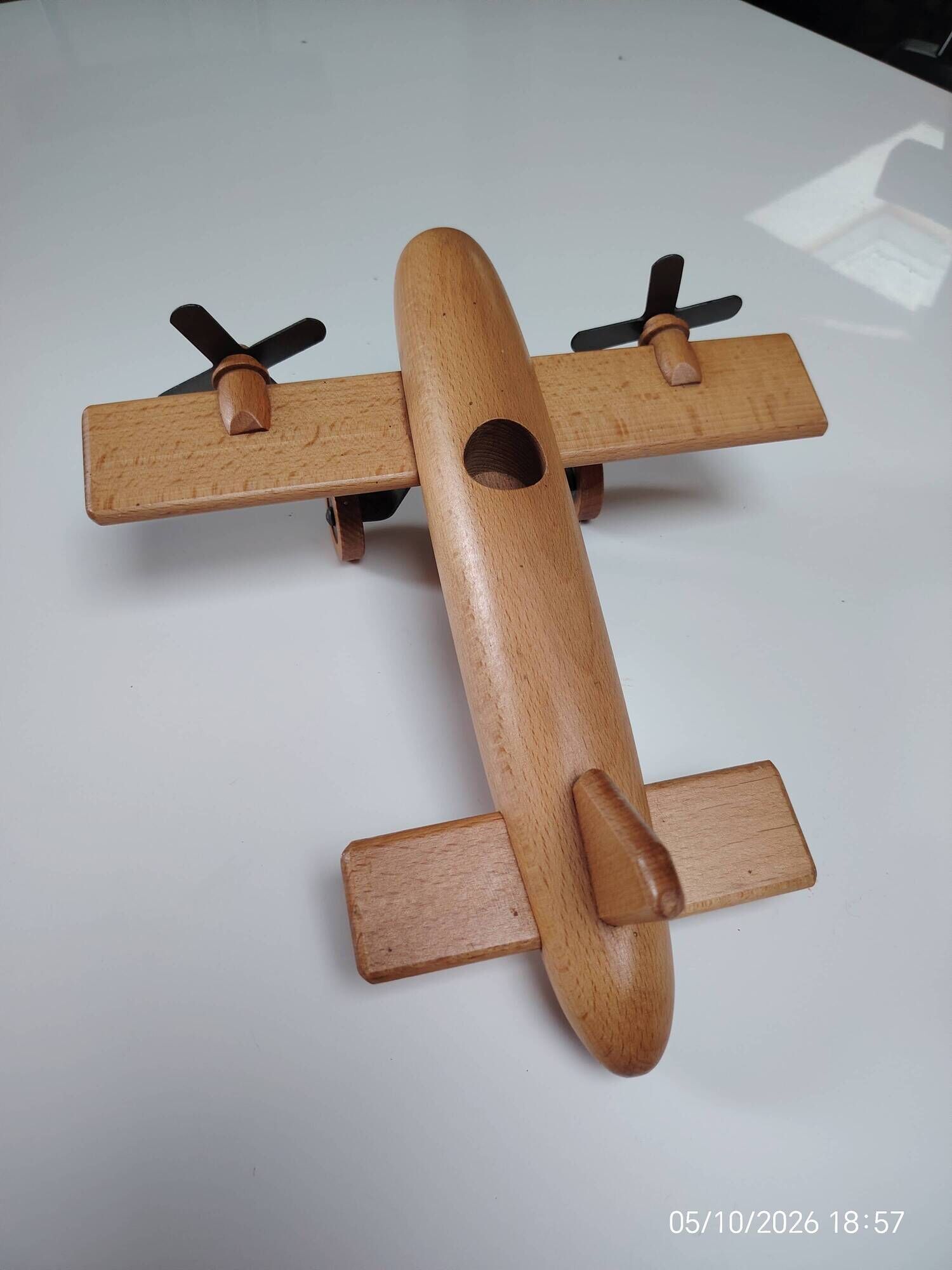 Vintage twin-engine aircraft in solid beech - Moulin Roty (1990s)