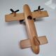 Vintage twin-engine aircraft in solid beech - Moulin Roty (1990s)