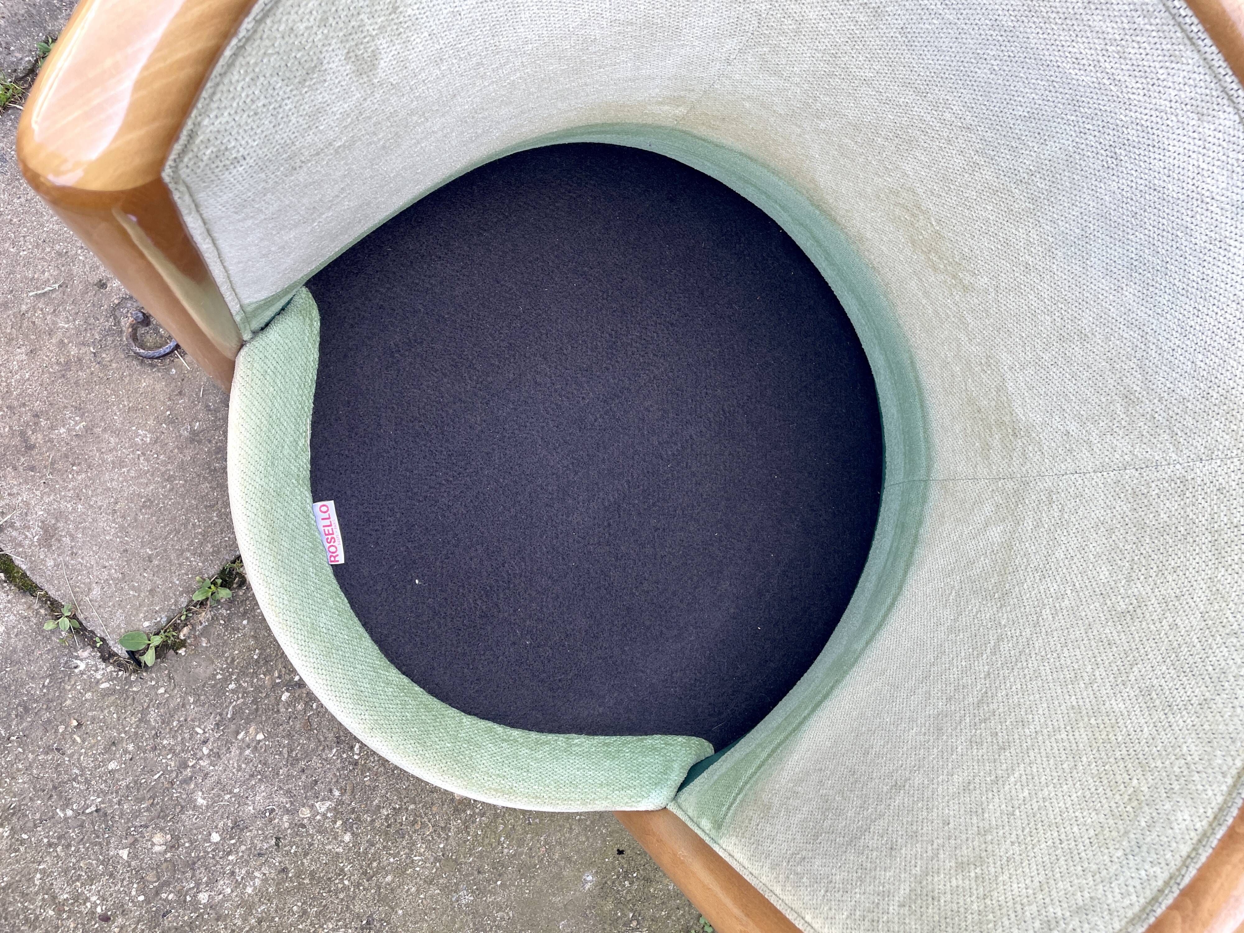 Pair of barrel-shaped armchairs in beech and almond green velvet by Maison Rosello