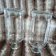 2 large antique transparent glass bottles