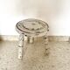 Patinated tripod stool