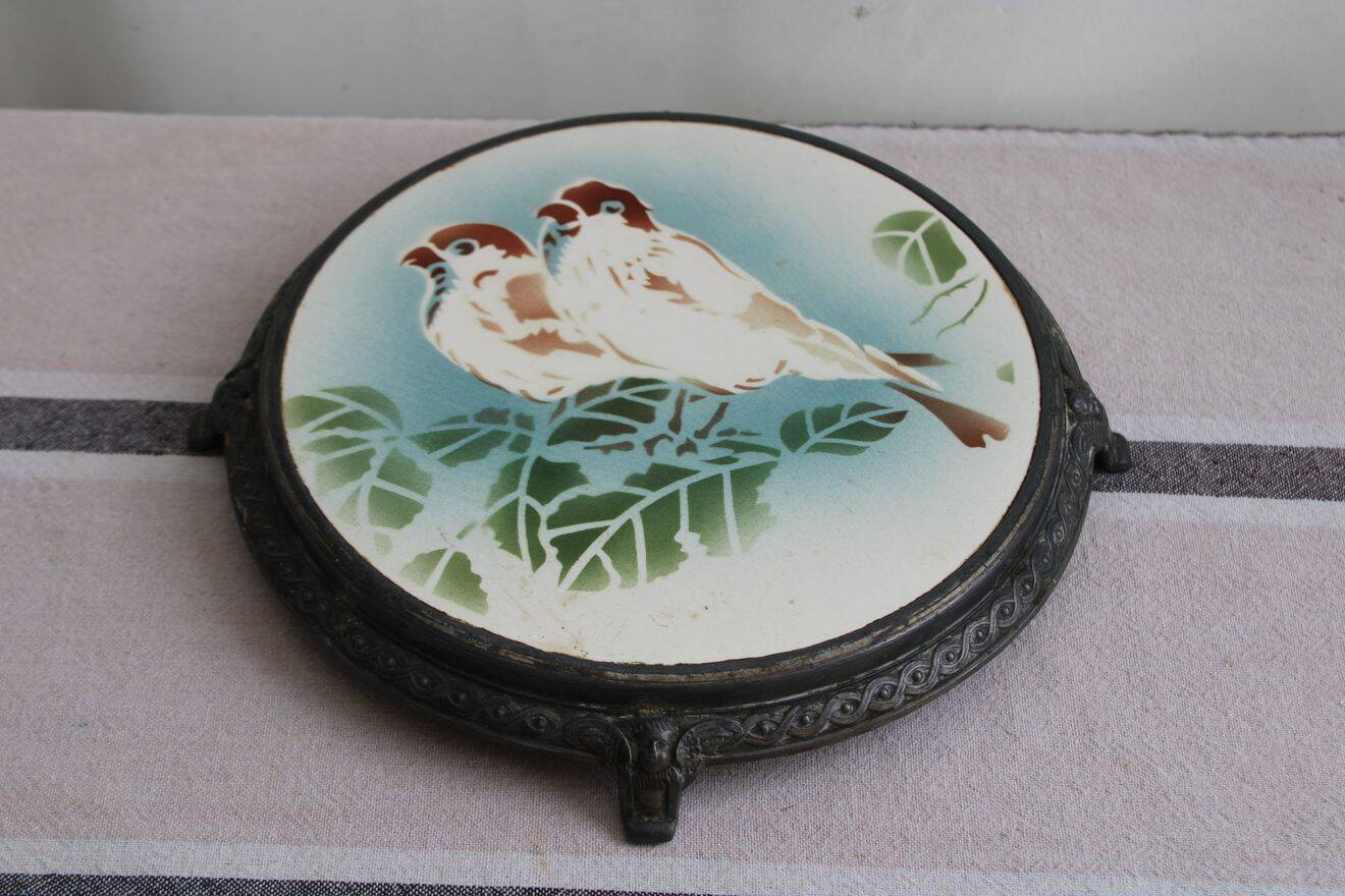 Antique ceramic trivet