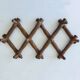 Old wooden wall coat rack