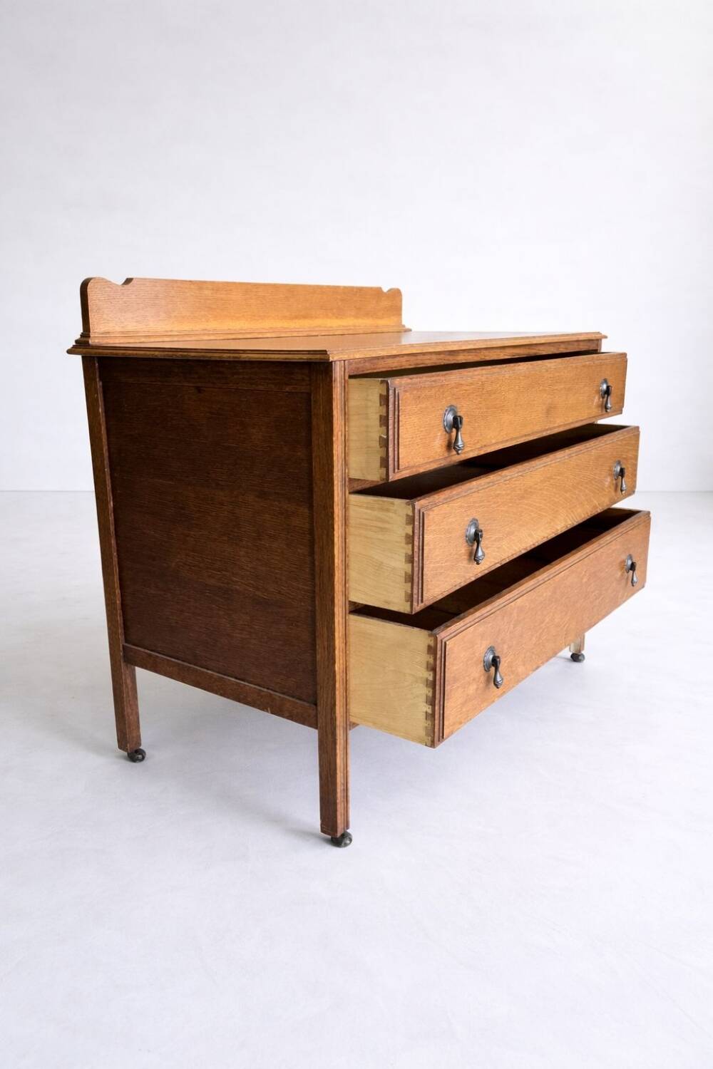 Antique English oak commode with a backrest, 3 drawers.