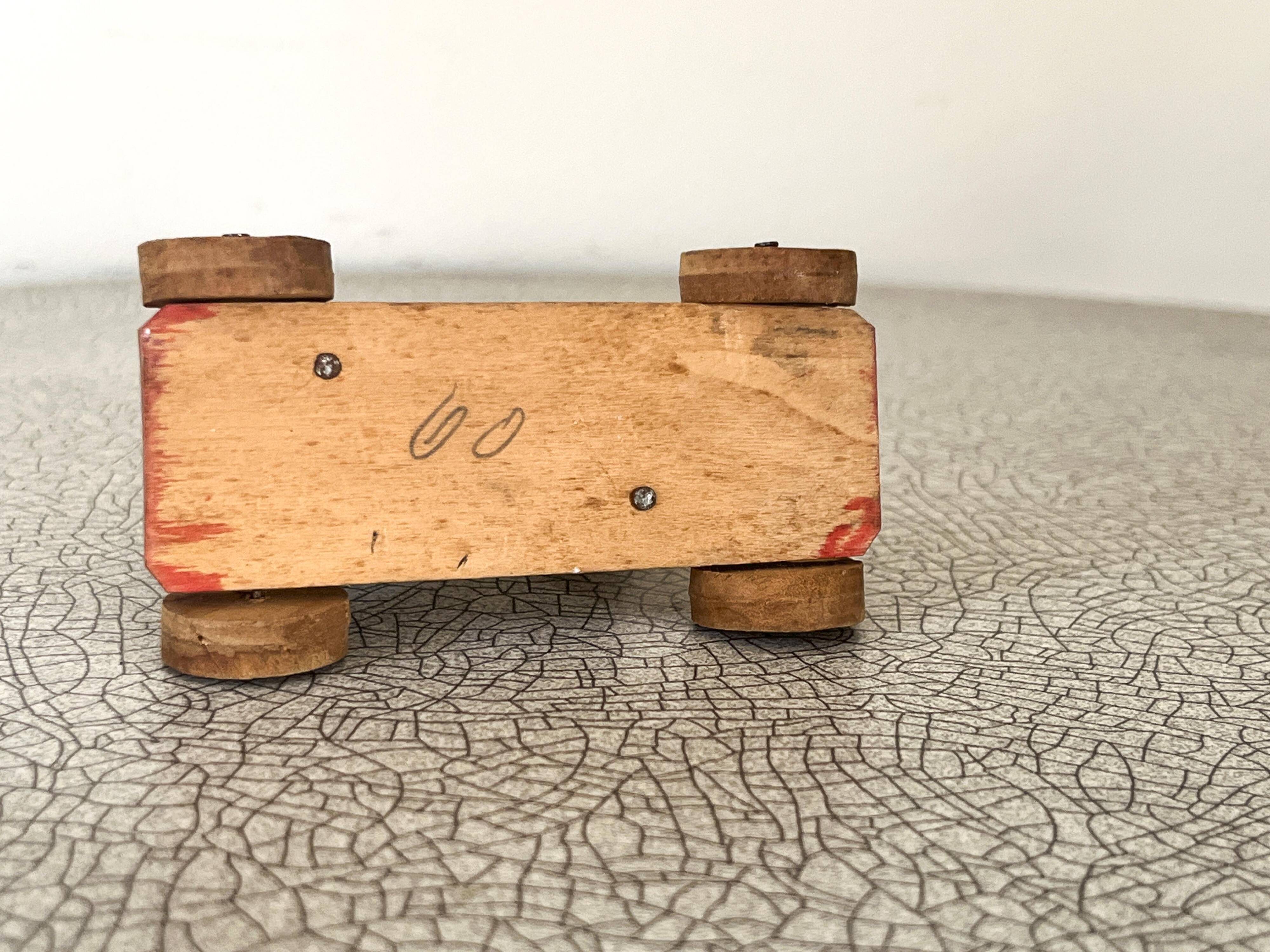 Old wooden pull-along toy, horse.