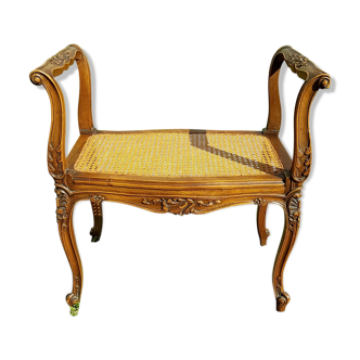 Former seat, wood and caning.