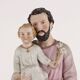 Ancient sculpture of Saint Joseph in a display case, Italy 1900s, polychrome porcelain.