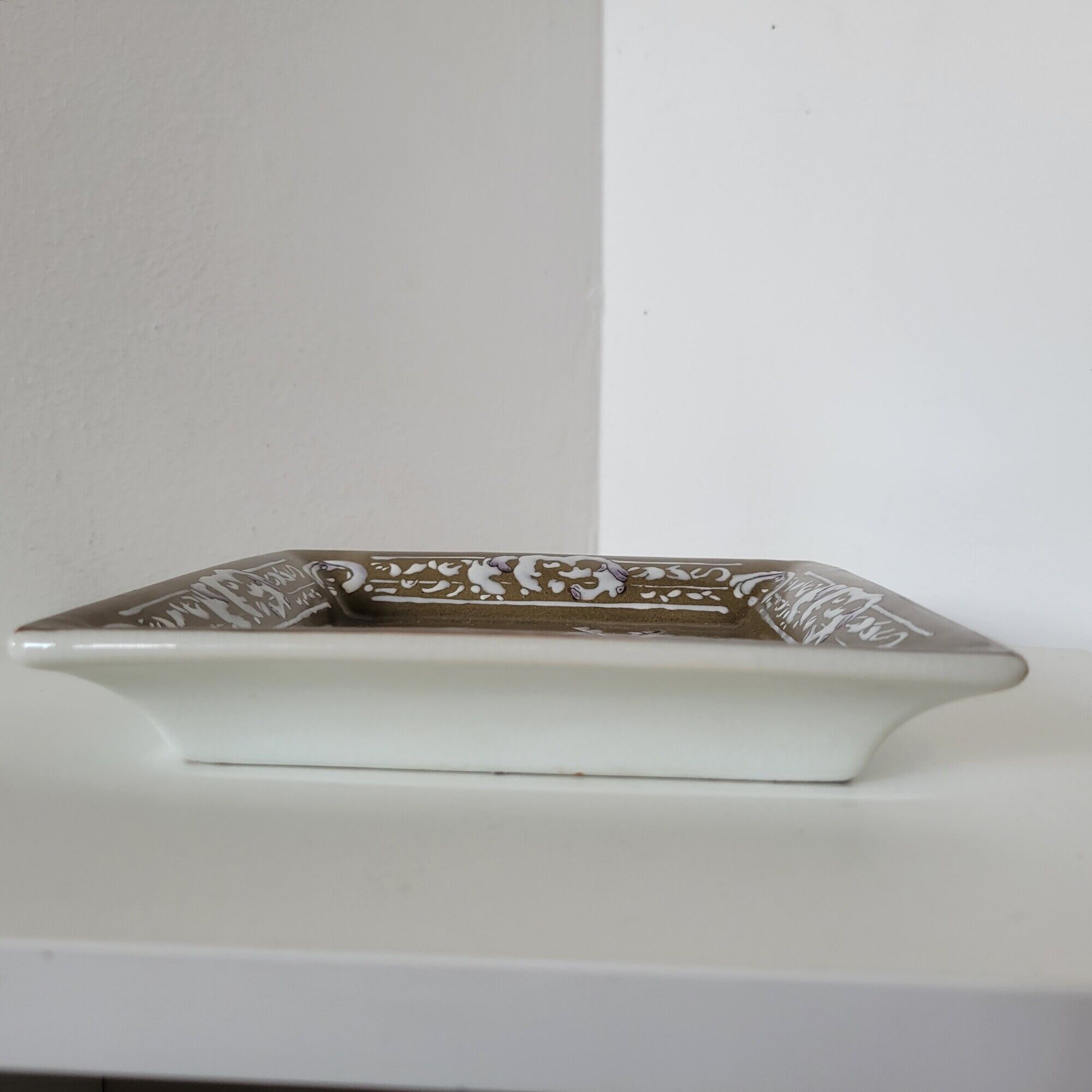Empty ceramic square pocket after the design of Anne Froget for Jardin d'Ulysse