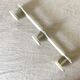 Vintage metal coat rack with 3 hooks