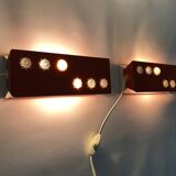 Pair of Scandinavian wall sconces with swivel shade in orange metal. 70