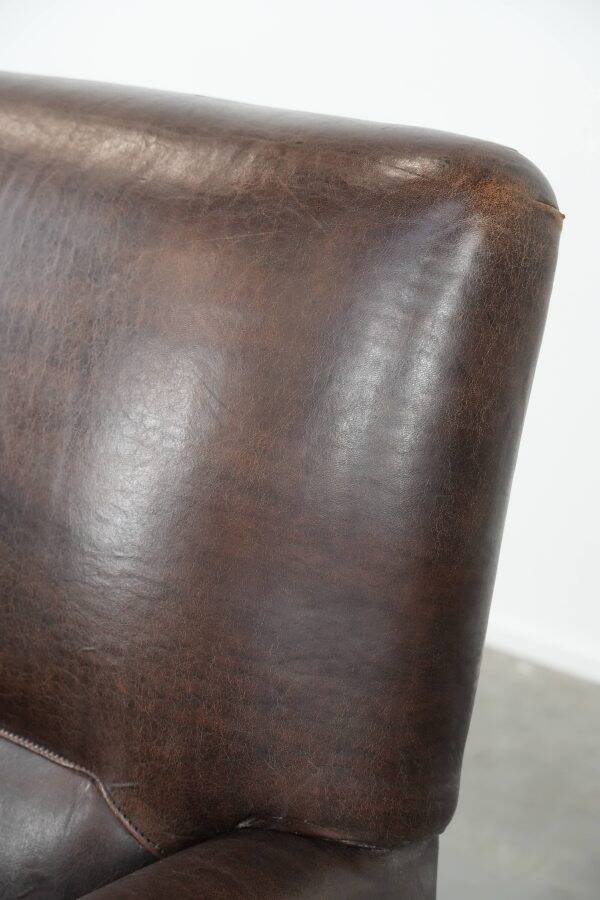 Characterful sheep leather armchair with a beautiful deep colour