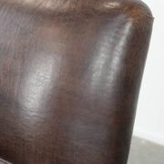 Characterful sheep leather armchair with a beautiful deep colour