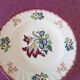 Set of 5 flat plates, signed Longwy.
