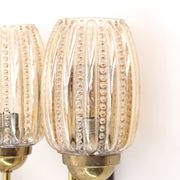 Pair of Graewe wall lights in brass and tinted glass, 1960s.