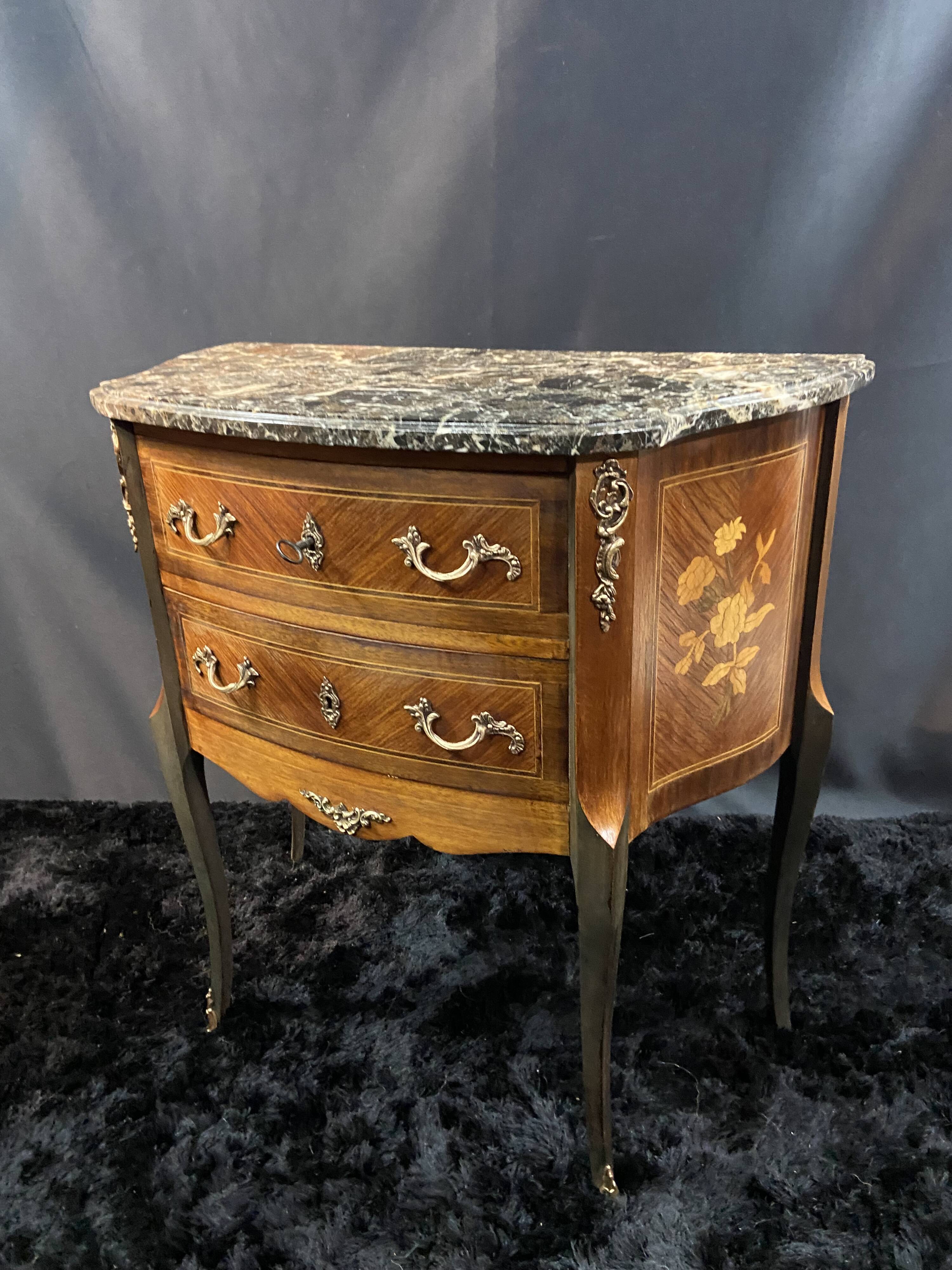 Small Louis XV style half-moon commode with marquetry and bronze decoration