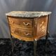 Petite commode demi-lune à décor marqueté et bronze style Louis XV